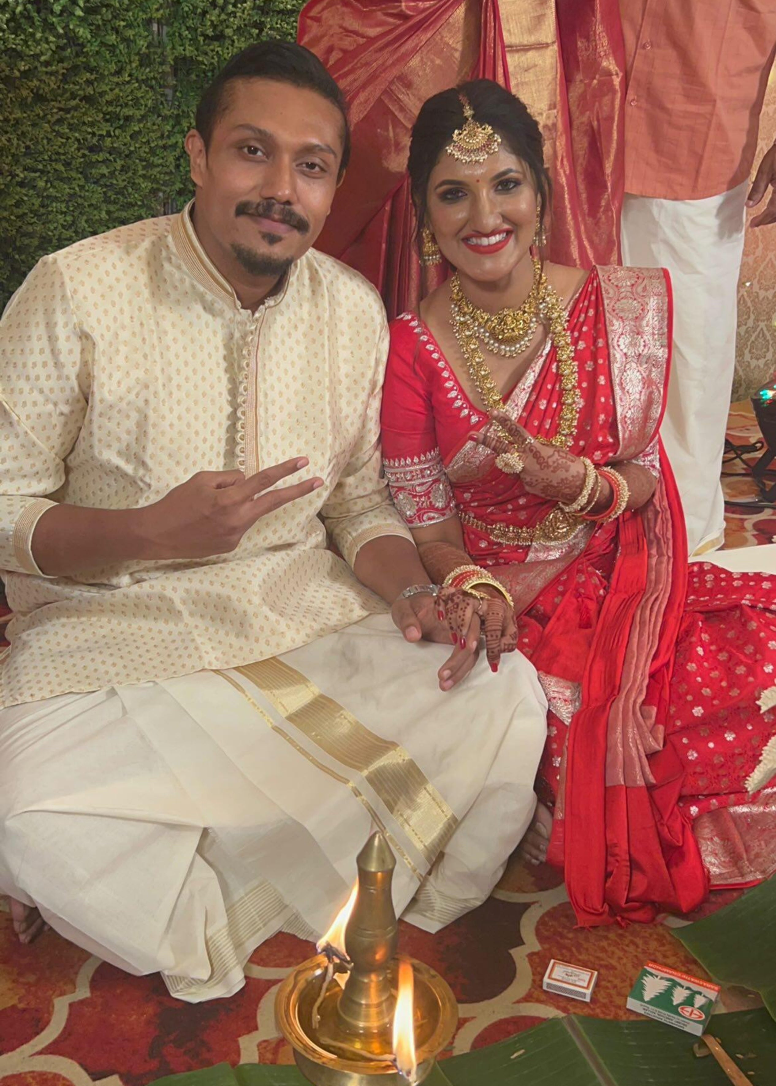 Traditional wedding ceremony with a couple in formal attire.