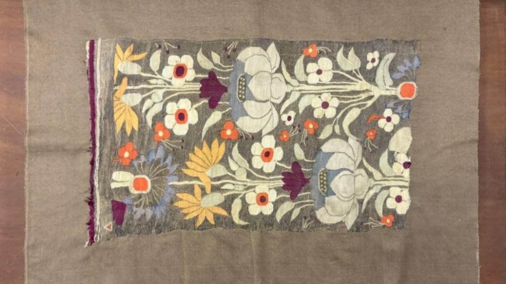 Decorative fabric with floral patterns on a brown background